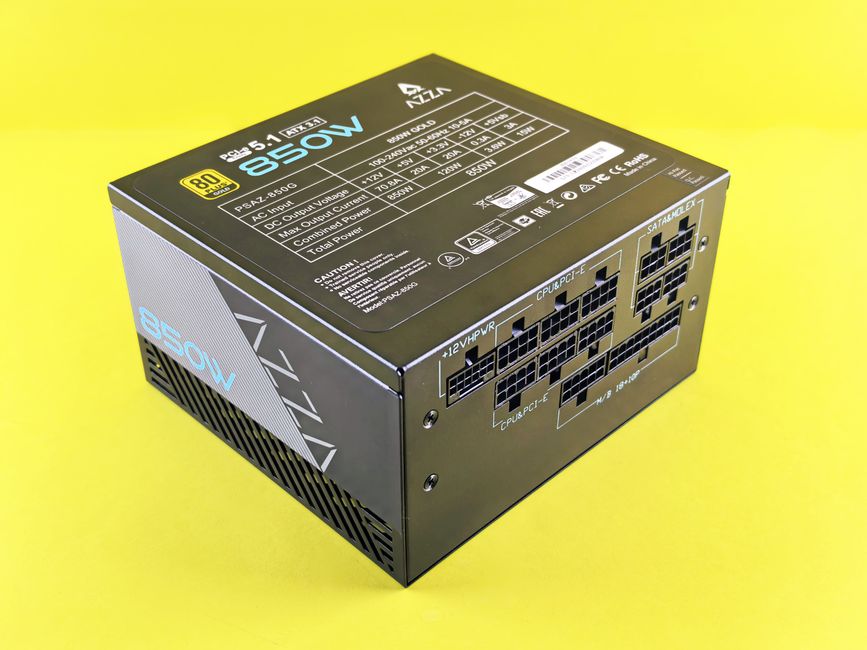 Compact 850W PSU with 80 Plus Gold certification on yellow backdrop, efficient for gaming PCs.