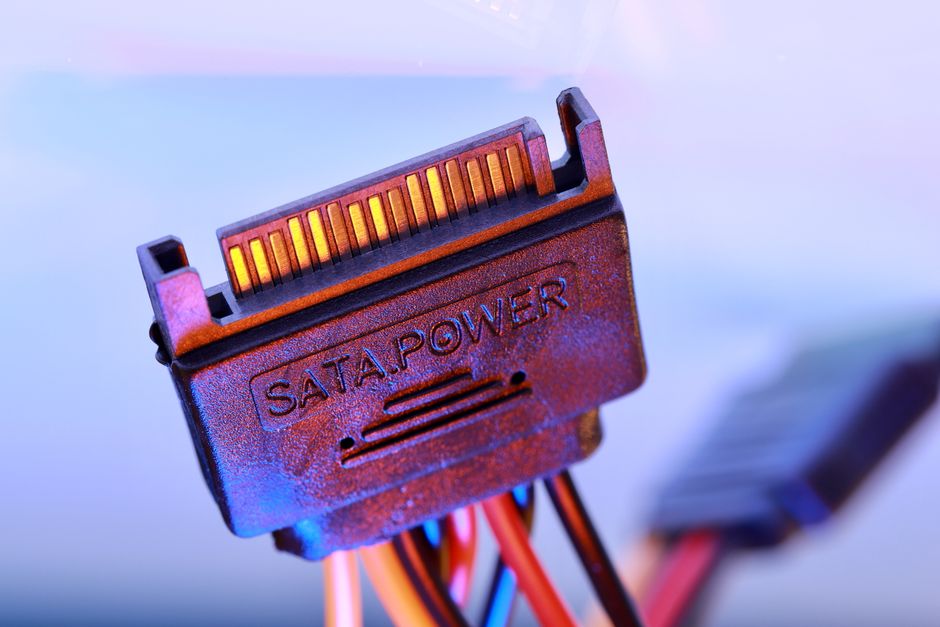 Detailed view of a SATA power cable connector with colorful wiring.